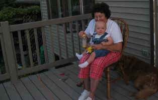 Grandma watches William as we work on the deck.
