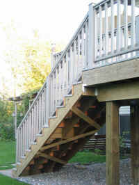 The finished stair railing -- meets code!